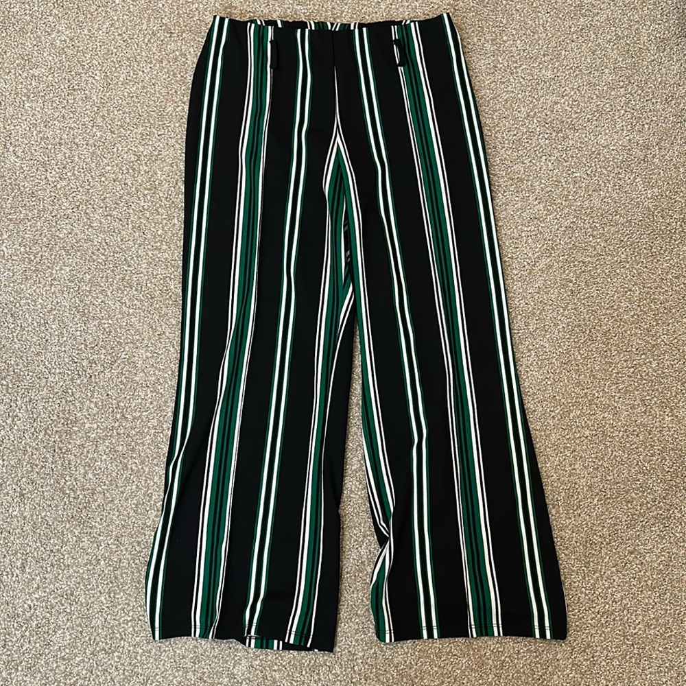 Black, white and green striped pants.